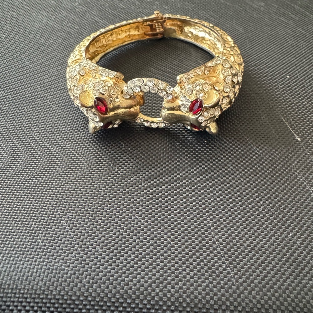 B.O. Vintage Spring closure, ruby red eyes, gold tone tiger bracelet